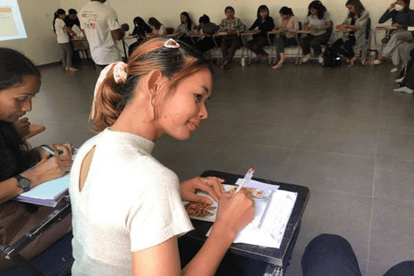 TDSO Teacher Training in Cambodia, students engaged in learning activities.