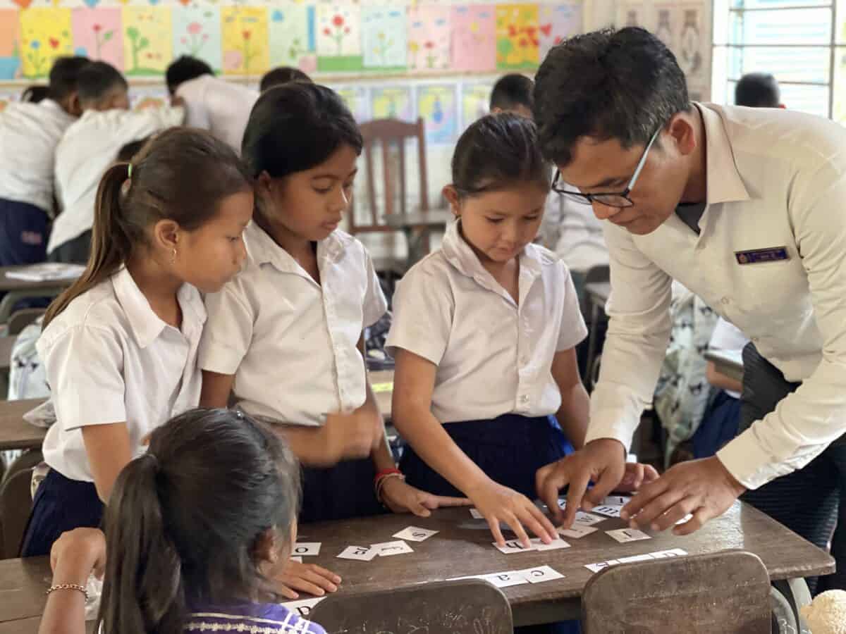 TDSO Teacher Training in Cambodia with students and an instructor.